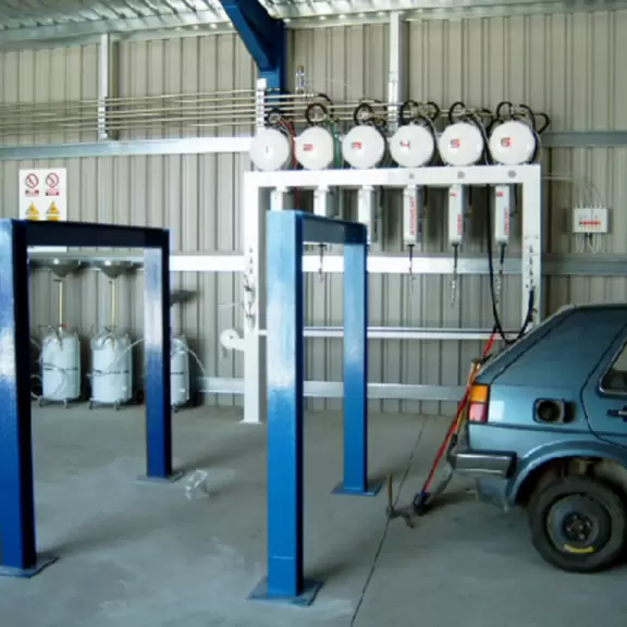 Automotive fluid extraction portico for ELV (End of Life Vehicles)